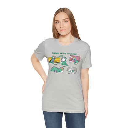 Kitty and Corgi - Things To Do As A Dino - Super Soft Cotton Airlume Unisex T-Shirt (Horizontal Graphic)
